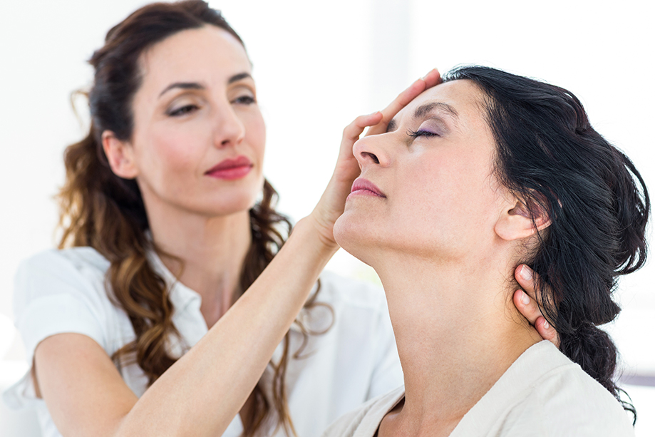 woman holding another woman's head