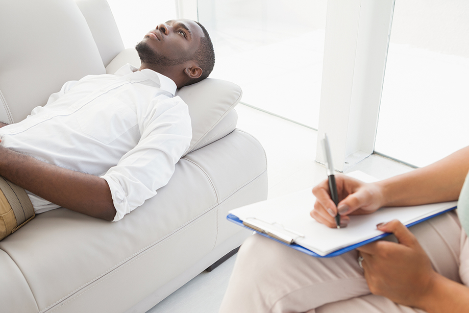 man lying down for hypnotherapy