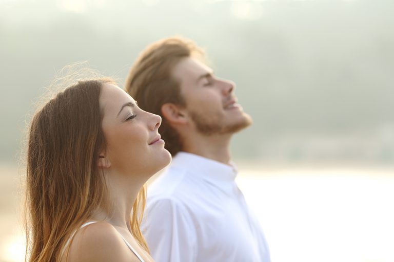 woman and man deep breath
