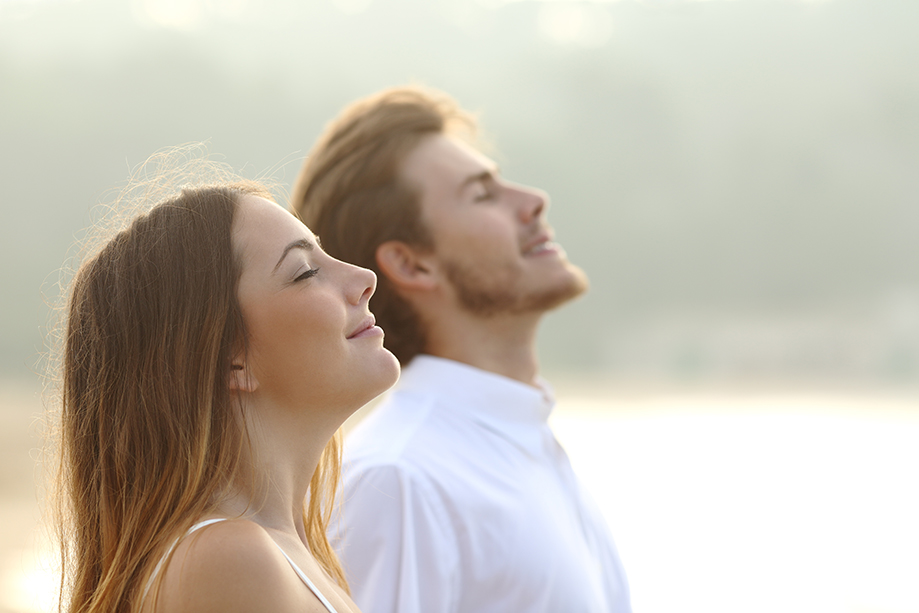 woman and man deep breath