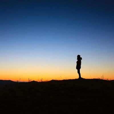 silhouette of a woman standing