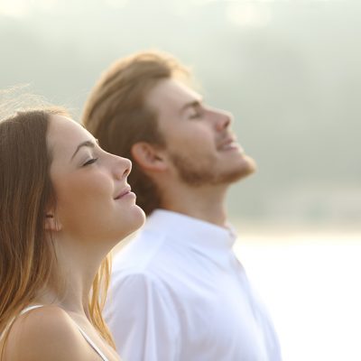 woman and man deep breath